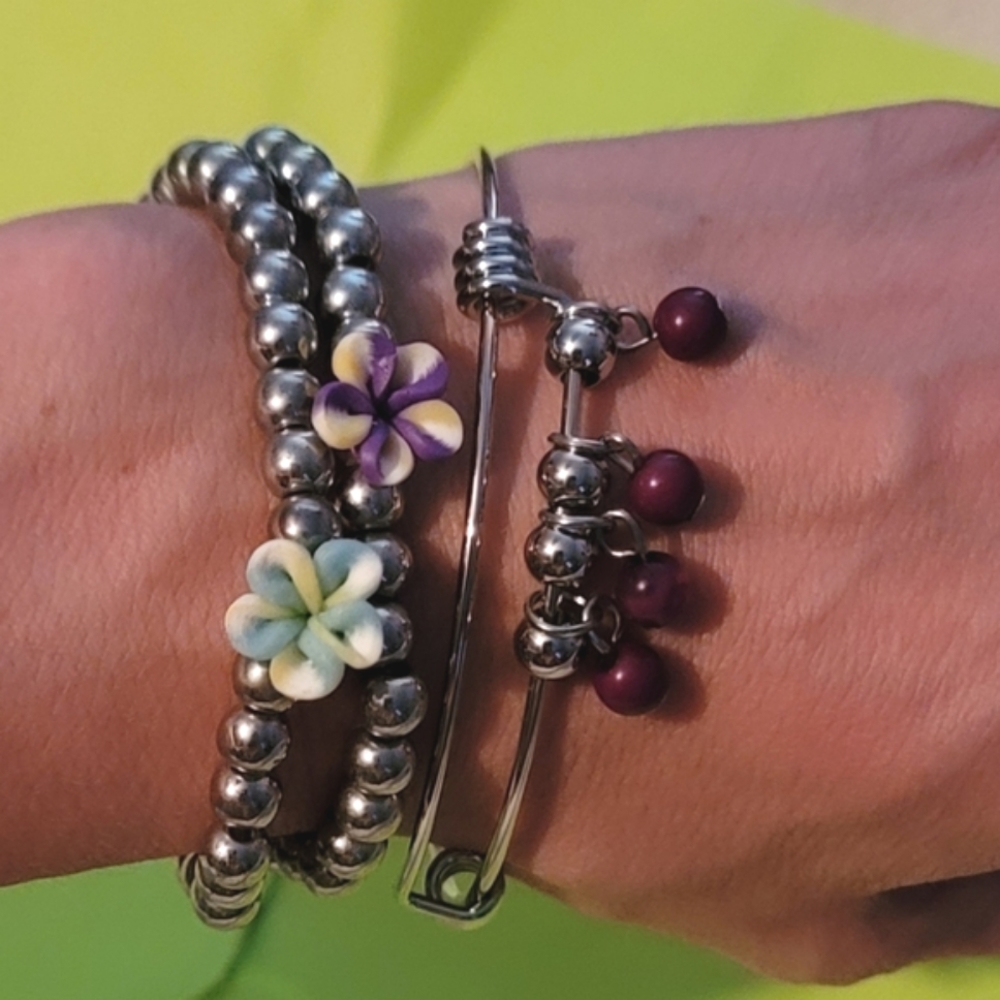 Bundle Of Floral Beaded Bracelets